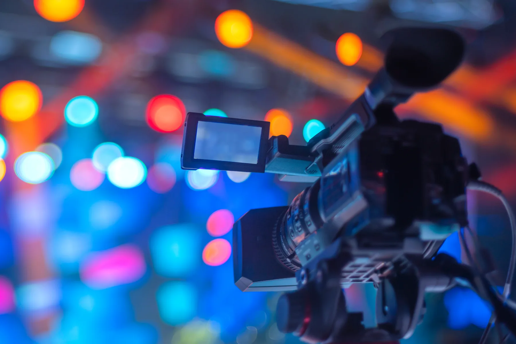 A camera on a lit production stage